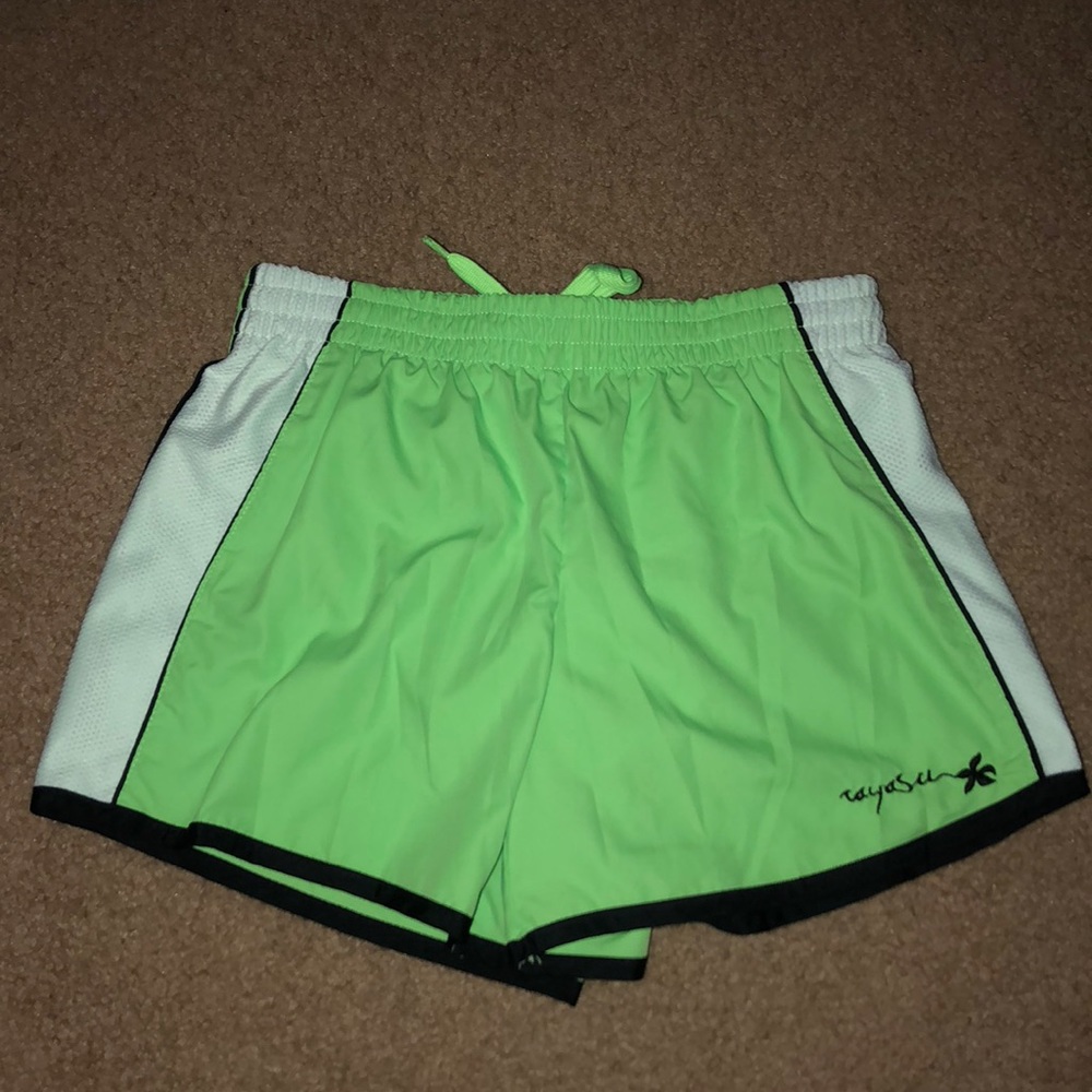 Green running shorts